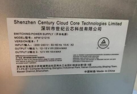 APW121215 ver f power supply label showing 200-240 V input and 12-15 V output