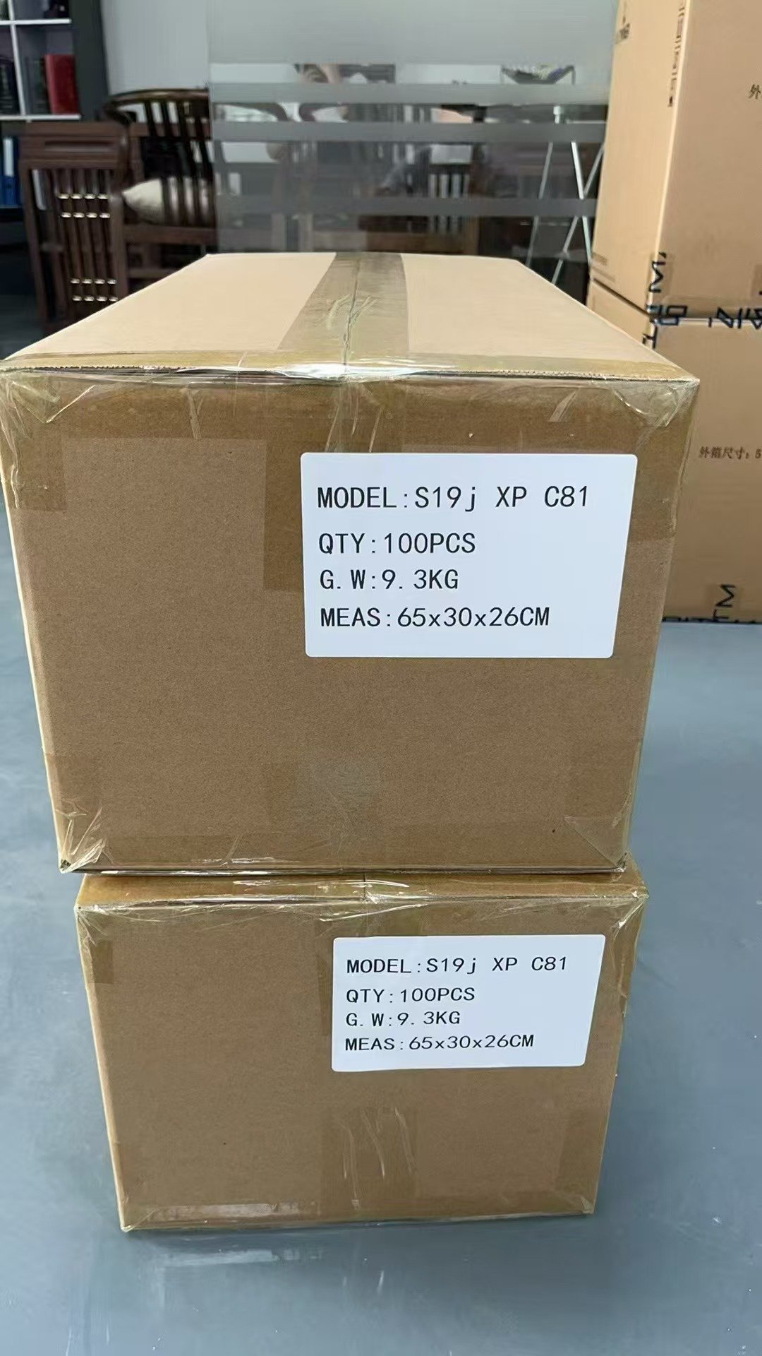 Boxed control boards labelled with model and quantity for shipment