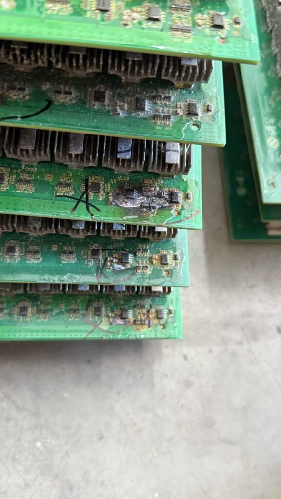 Burned and corroded components on ASIC hashboards